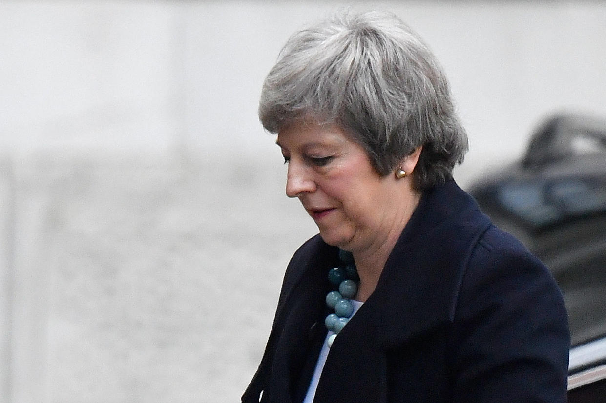 A downcast Theresa May arriving at Downing Street (Reuters)