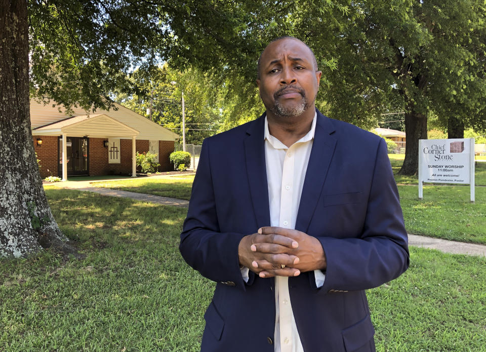 The Rev. Andre E. Johnson speaks Thursday, June 13, 2019, about the confrontation Wednesday night between residents and police after a man was fatally shot by U.S. Marshals in Memphis, Tenn. Johnson was in the crowd when police released tear gas after people threw rocks and bricks at officers as tensions escalated after the shooting. (AP Photo/Adrian Sainz)