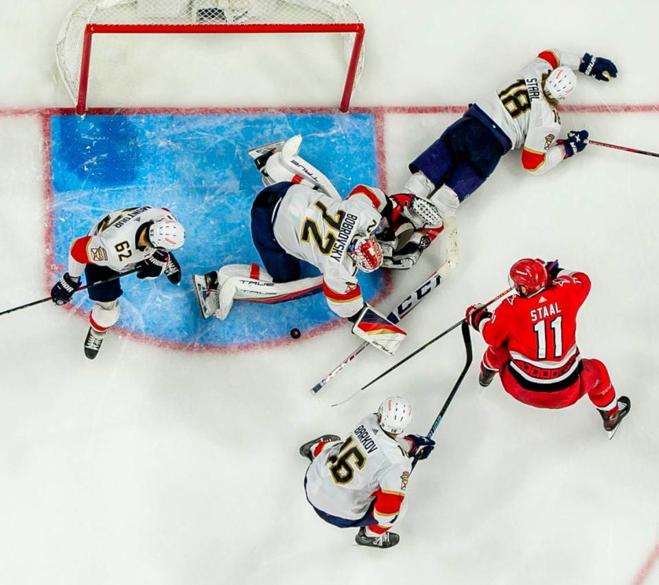 Florida Panthers goalie Sergei Bobrovsky (72) stops a scoring attempt by the Carolina Hurricanes Jordan Staal (11) in overtime during Game 2 of the Eastern Conference Finals on Saturday, May 20, 2023 at PNC Arena in Raleigh, N.C.