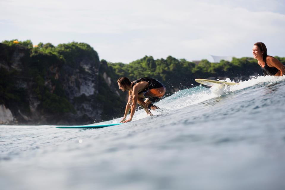 Surfers are attracted to Bali's south - Credit: Credit: Cavan Social / Alamy Stock Photo/Cavan Social / Alamy Stock Photo