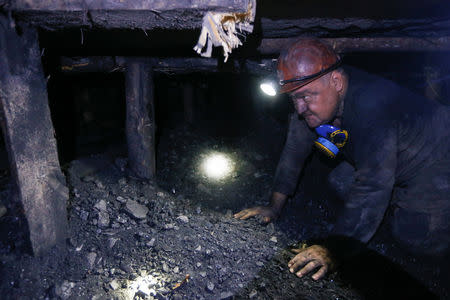 Mining engineer Volodymyr Matyukh works inside the Novovolynska-9 coal mine in Novovolynsk, Ukraine August 2, 2018. Picture taken August 2, 2018. REUTERS/Valentyn Ogirenko