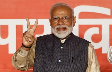 FILE PHOTO - Indian Prime Minister Narendra Modi gestures towards his supporters after the election results at Bharatiya Janata Party (BJP) headquarter in New Delhi