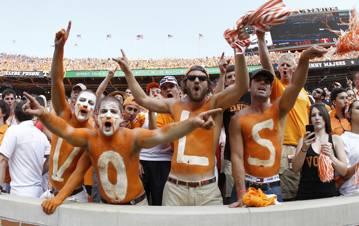 Tennessee fans yell in the first quarter of an NCAA college football game between the Tennessee Volunteers and the Florida Gators on Saturday, Sept. 15, 2012, in Knoxville, Tenn. (AP Photo/Wade Payne)