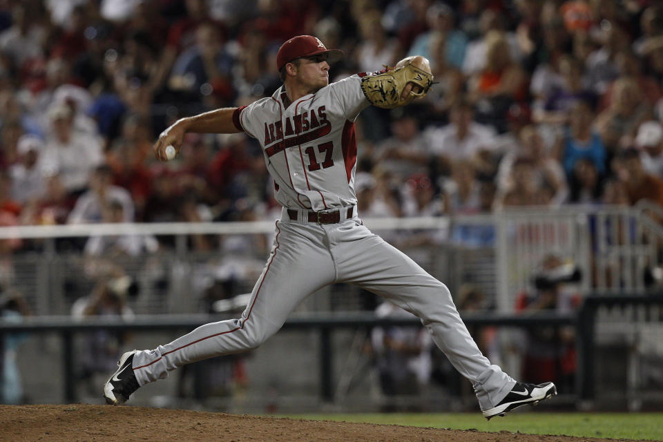 June 18, 2012; Omaha, NE, USA; Arkansas Razorbacks pitcher Barrett Astin (17) throws against the South Carolina Gamecocks during the seventh inning of game eight of the 2012 College World Series at TD Ameritrade Park. Arkansas won 2-1. Mandatory Credit: Bruce Thorson-USA TODAY Sports