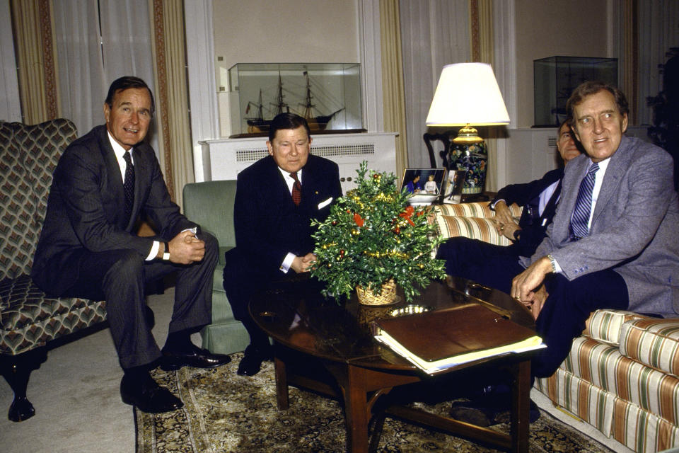 George H. W. Bush with Tower Commission members 