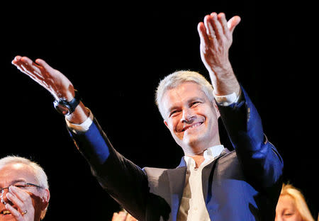 FILE PHOTO: Laurent Wauquiez, the front-runner for the leadership of French conservative party "Les Republicains" (The Republicans) attends a political rally in Saint-Priest, near Lyon, France, December 7, 2017. REUTERS/Robert Pratta/File photo