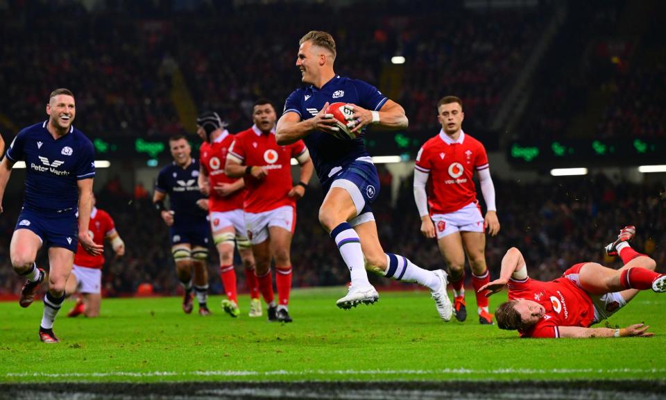 <span>Duhan van der Merwe races over the line to score a try during Scotland’s thrilling win against Wales.</span><span>Photograph: Phil Mingo/PPAUK/Shutterstock</span>