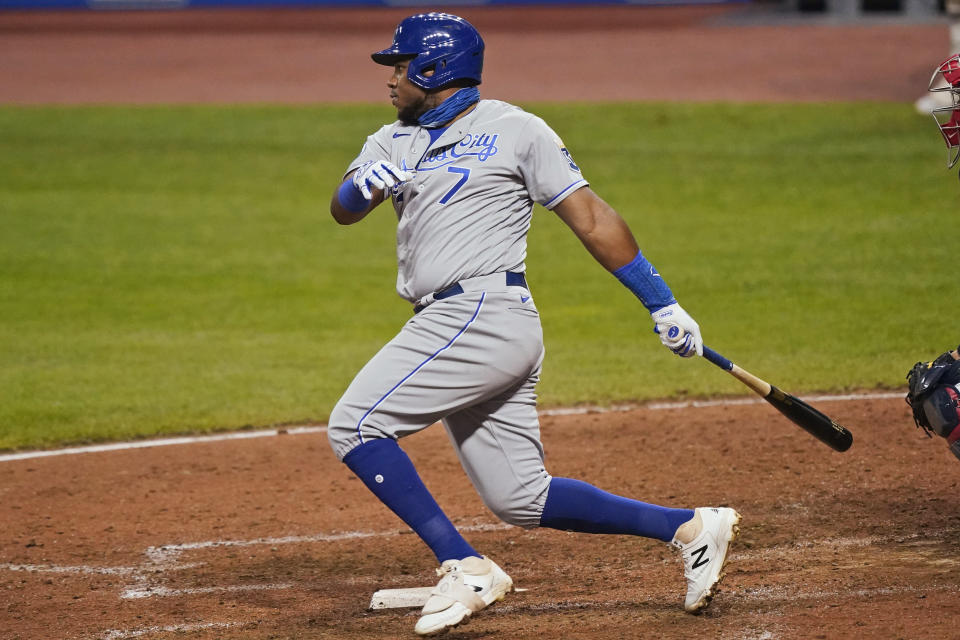 Kansas City Royals' Maikel Franco watches an RBI single during the ninth inning of the team's baseball game against the Cleveland Indians, Tuesday, Sept. 8, 2020, in Cleveland. The Royals won 8-6. (AP Photo/Tony Dejak)