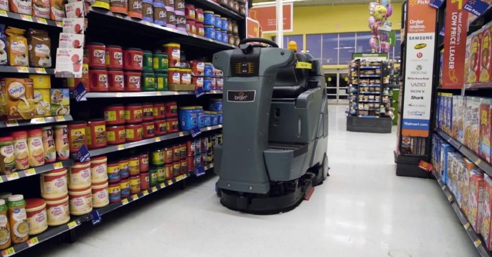 A Brain Corp. autonomous floor scrubber, or Auto-C, at a Walmart store. (Photo: Walmart)