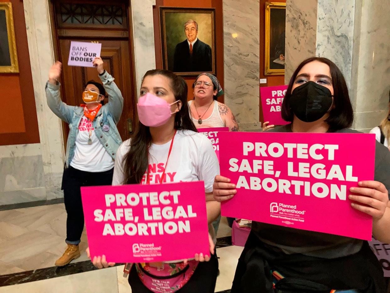 FILE - Abortion-rights supporters chant their objections at the Kentucky Capitol, April 13, 2022, in Frankfort, Ky. Abortion-rights groups filed a court motion on Tuesday, June 20, 2023, seeking to dismiss their lawsuit challenging Kentucky's near-total abortion ban but signaled that the legal fight is far from over. (AP Photo/Bruce Schreiner, File)