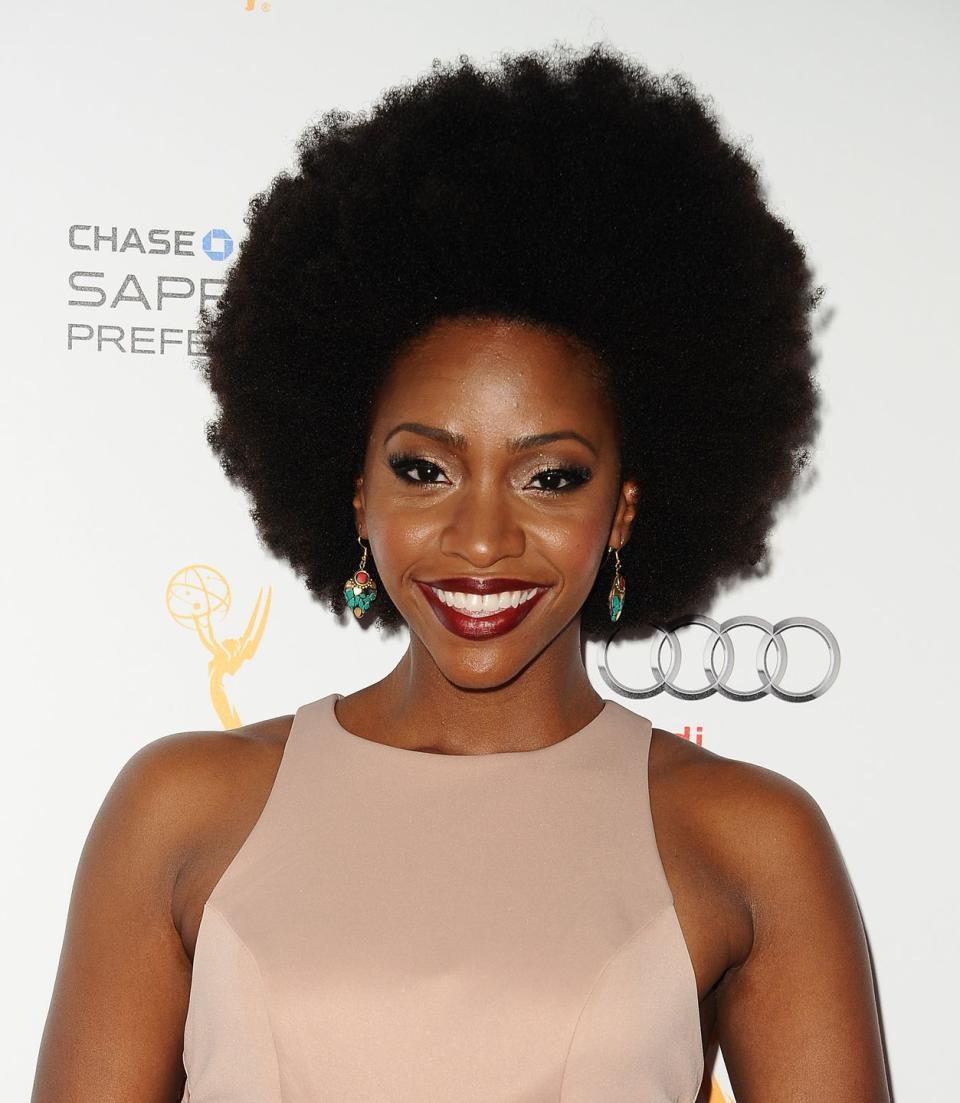 <p>Afros are timeless and head-turning. To get a voluminous look like actress <strong>Teyonah Parris</strong>, use a wide tooth hair pick to comb out your curls until you've achieved the volume and shape you want. </p>