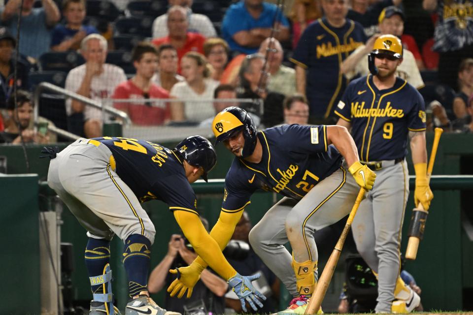 Aug 2, 2024; Washington, District of Columbia, USA; Milwaukee Brewers catcher William Contreras (24) celebrates with shortstop Willy Adames (27) after hitting a home run against the Washington Nationals during the seventh inning at Nationals Park. Mandatory Credit: Rafael Suanes-USA TODAY Sports