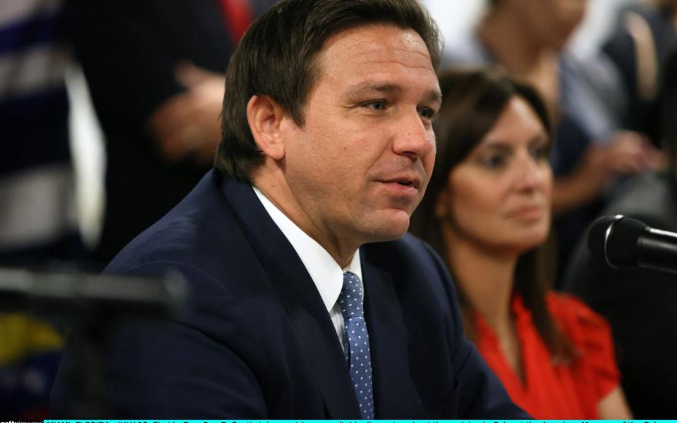 Florida Gov. Ron DeSantis takes part in a roundtable discussion about the uprising in Cuba at the American Museum of the Cuba Diaspora on July 13, 2021 in Miami, Florida. Thousands of people took to the streets in Cuba on Sunday to protest against the government. (Photo by Joe Raedle/Getty Images) - Getty Images