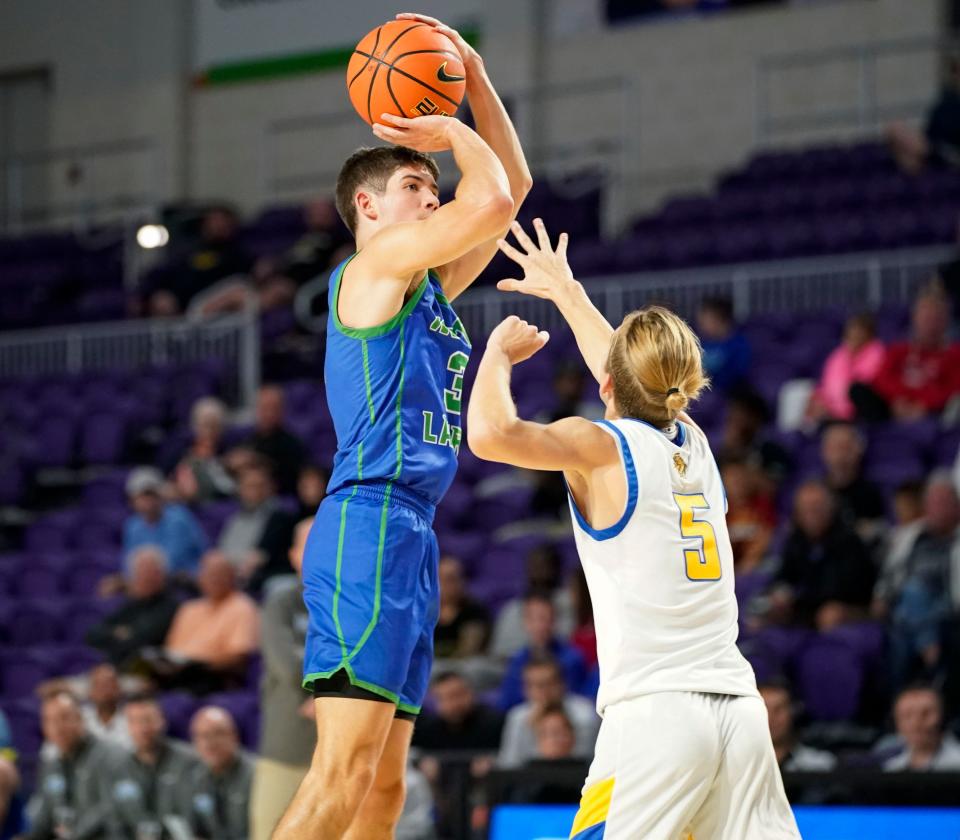 North Laurel Jaguars guard Reed Sheppard (3) shoots a three point basket during the first quarter of a game against the Charlotte Tarpons during the 49th annual City of Palms Classic at Suncoast Arena in Ft. Myers on Friday, Dec. 16, 2022. 