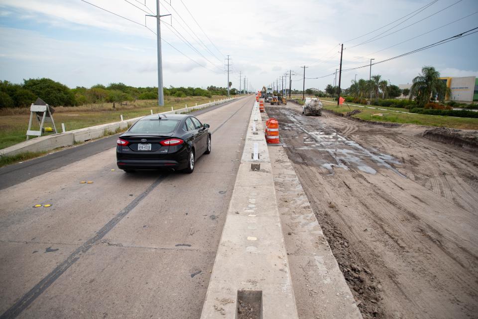 Construction crews work to widen Rodd Field Road from Saratoga Boulevard to Yorktown Boulevard on Tuesday, July 23, 2019.