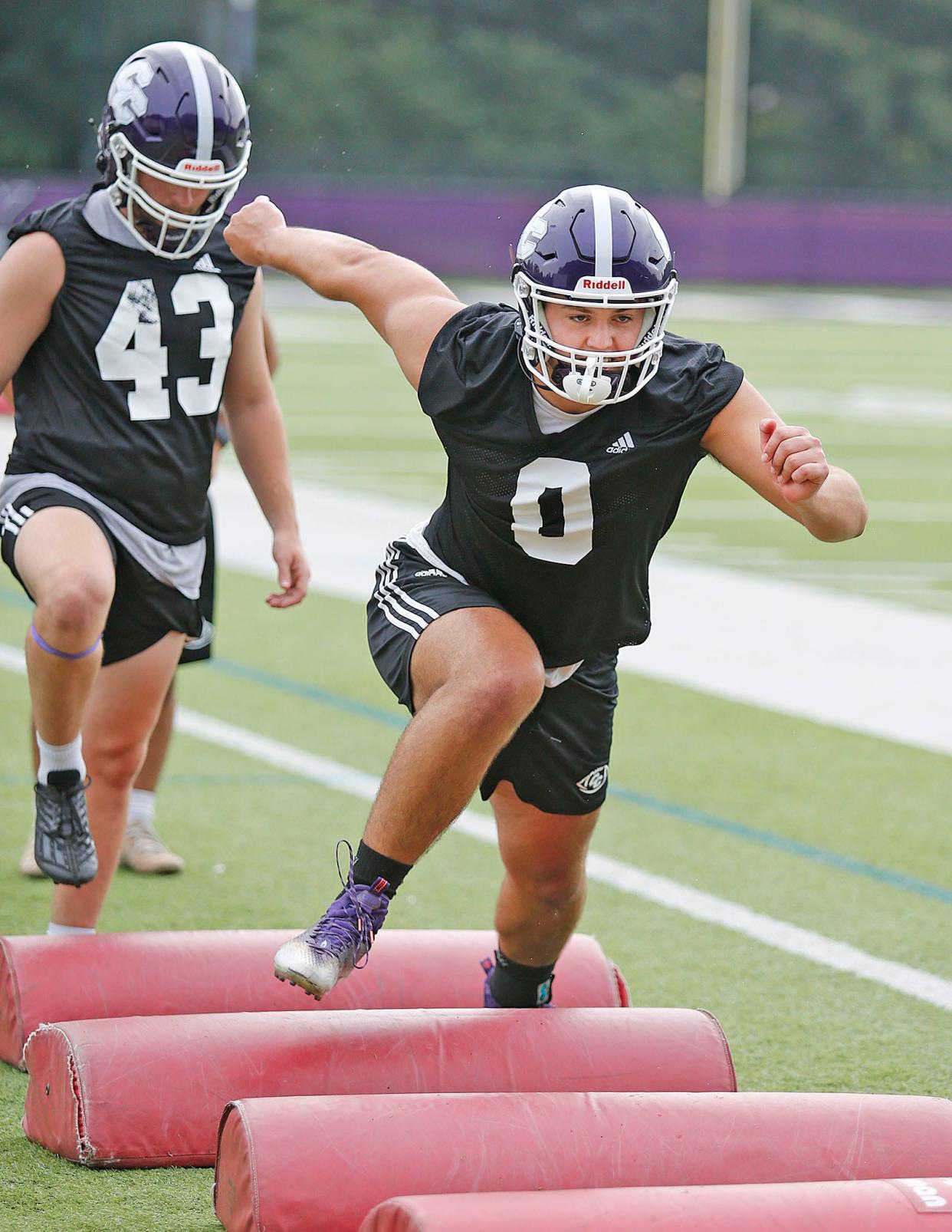 Mike Sims, a linebacker, is a captain. The Curry College Colonels start the new football season on the practice field on Thursday, Aug. 10, 2023.