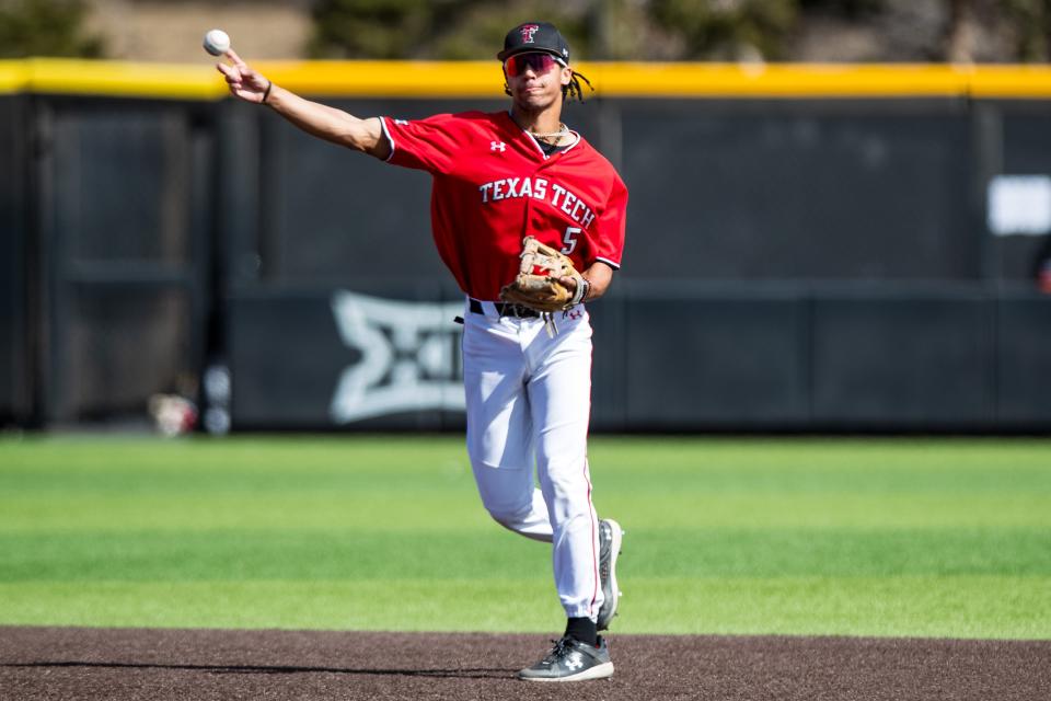 Texas Tech's TJ Pompey (5) throws the ball to first base during the non-conference baseball game against Gardner-Webb, Saturday, March 2, 2024, at Rip Griffin Park.