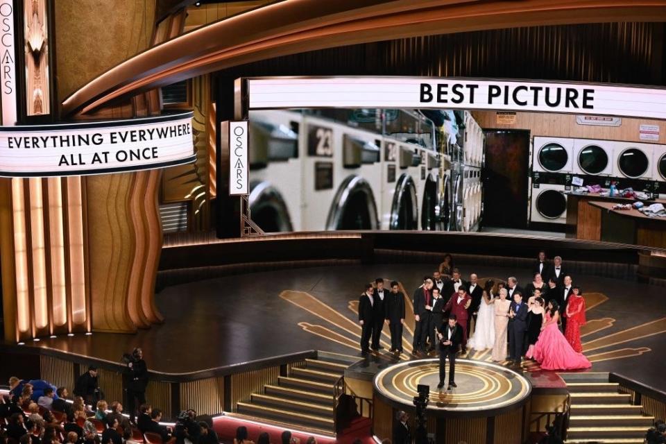 Jonathan Wang accepts the Oscar for Best Picture for "Everything Everywhere All at Once" onstage