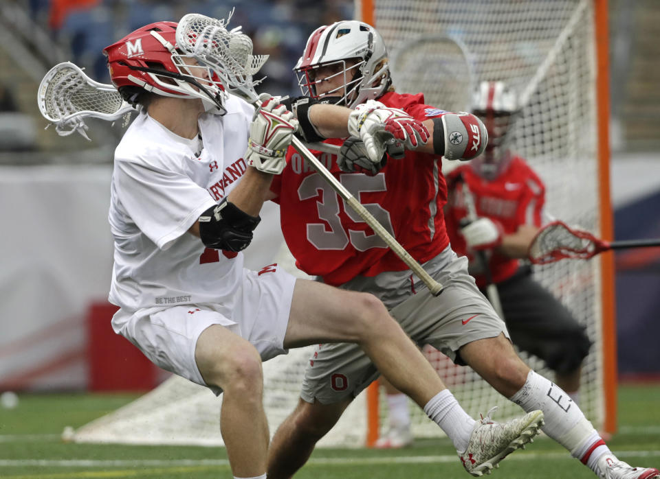 FILE - Ohio State's Logan Maccani (35) defends against Maryland's Jared Bernhardt, left, during the first half of the NCAA college Division 1 lacrosse championship final, Monday, May 29, 2017, in Foxborough, Mass. Just two years after being honored as the nation’s top college lacrosse player, Bernhardt is trying to make it as an NFL receiver with the Atlanta Falcons. (AP Photo/Elise Amendola, File)