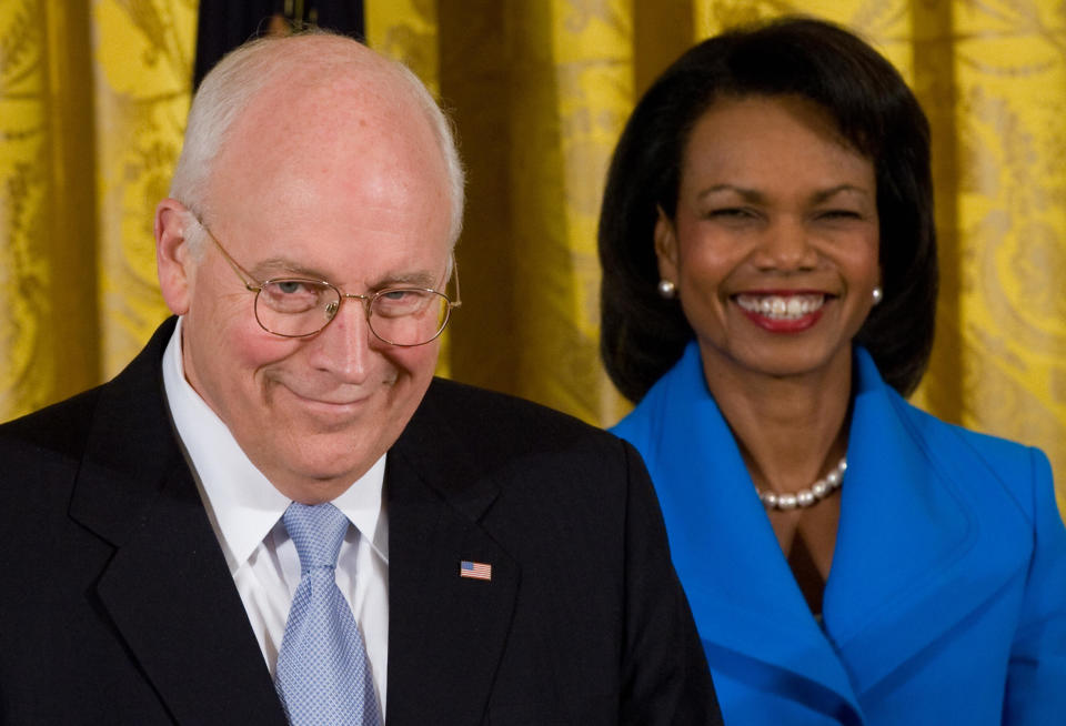 Vice President Dick Cheney and Secretary of State Condoleezza Rice listen as President George W. Bush speaks prior to signing the United States - India Nuclear Cooperation Approval and Nonproliferation Enhancement Act in the East Room of the White House in Washington, DC, on October 8, 2008. (SAUL LOEB/AFP/Getty Images)