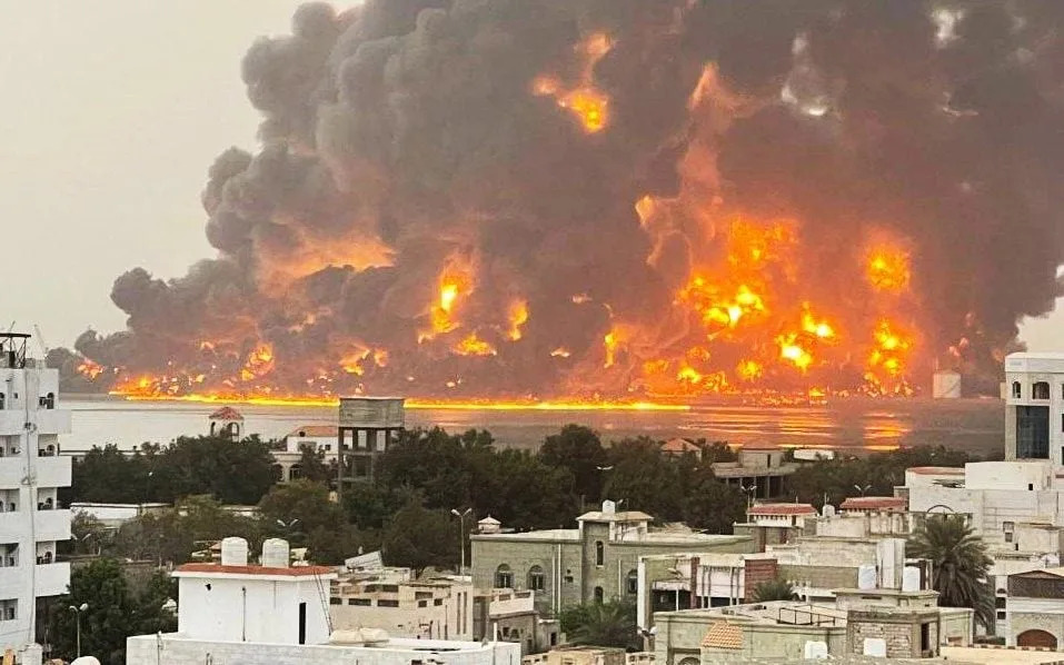 Flames from an Israeli strike on Yemen's al-Hudayah port