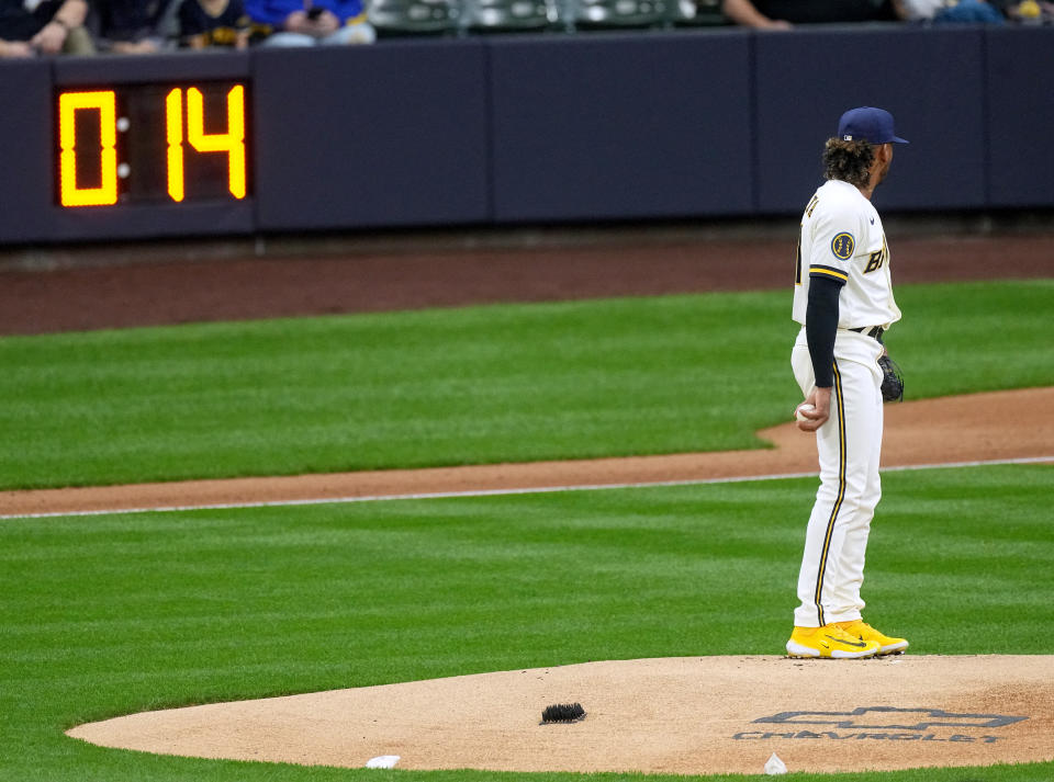 Apr 3, 2023; Milwaukee, Wisconsin, USA; The pitch clock winds down as Milwaukee Brewers starting pitcher Freddy Peralta (51) stands on the mound during the first inning of their game against the New York Mets at American Family Field. Mandatory Credit: Mark Hoffman/Milwaukee Journal Sentinel-USA TODAY Sports