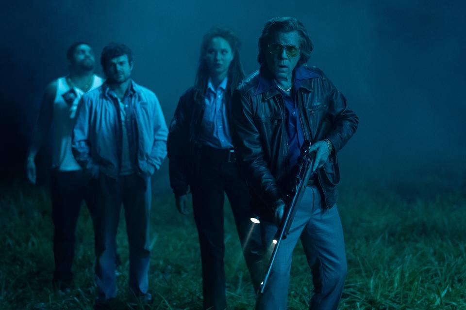 From left, Daveed (O’Shea Jackson, Jr.), Eddie (Alden Ehrenreich), Officer Reba (Ayoola Smart) and Syd (Ray Liotta) in “Cocaine Bear,” directed by Elizabeth Banks.