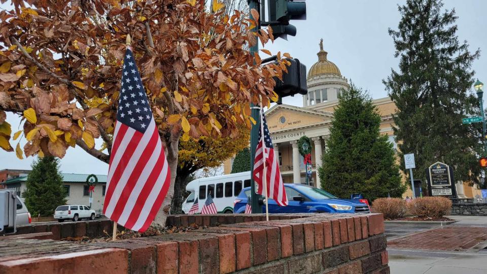 On Veterans Day, the Hendersonville Rotary Club placed 300 American flags in the planters located on Main Street.