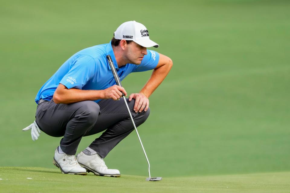 Patrick Cantlay lines up his putt on the second green during the first round of The Masters golf tournament at the Augusta National Golf Club in Augusta, Ga., on April 6, 2023.