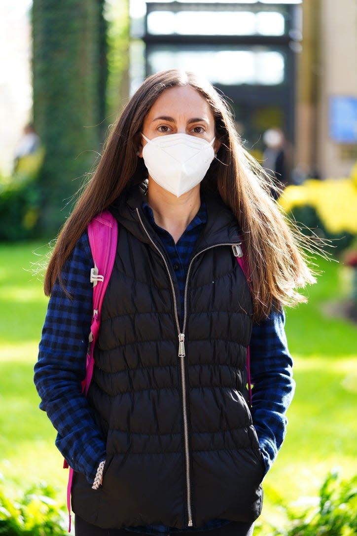 a woman with a mask on her face