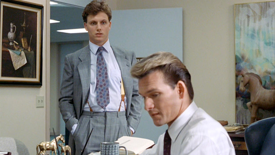 LOS ANGELES - JULY 13: The movie "Ghost", directed by Jerry Zucker and written by Bruce Joel Rubin. Seen here, from left, Tony Goldwyn as Carl Bruner observes Patrick Swayze as Sam Wheat working at Market Security Bank & Trust. Initial theatrical release July 13, 1990. Screen capture. Paramount Pictures. (Photo by CBS via Getty Images)