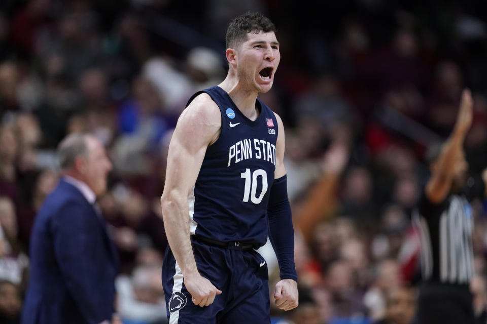 Penn State guard Andrew Funk celebrates after making a 3-point basket in the first half of a first-round college basketball game against Texas A&M in the NCAA Tournament, Thursday, March 16, 2023, in Des Moines, Iowa. (AP Photo/Charlie Neibergall)