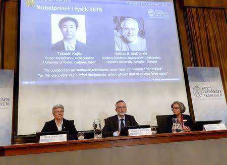 Professors Anne L'Huillier (L-R), Goran K. Hansson and Olga Botner, members of the Nobel Assembly, talk to the media at a news conference in Stockholm October 6, 2015. Japan's Takaaki Kajita and Canada's Arthur B. McDonald won the 2015 Nobel Prize for Physics for their discovery that neutrinos, labelled nature's most elusive particles, have mass, the award-giving body said on Tuesday. REUTERS/Fredrik Sandberg/TT News Agency