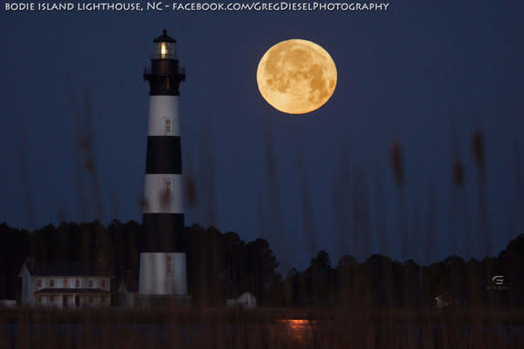 Astrophotographer Greg Diesel Walck sent in a photo of the full moon setting by the Bodie Island Lighthouse, Outer Banks, NC, taken March 27, 2013. He writes: "I have been trying to get a shot like this for almost a year. The weather and timin
