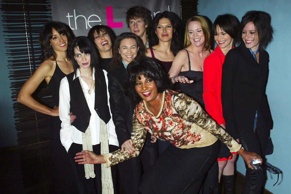Cast members Jennifer Beals, Pam Grier, Erin Daniels, Leisha Hailey, Laurel Holloman, Mia Kirshner, Karina Lombard, Eric Mabius, Katherine Moennig and Executive Producer Ilene Chaiken at a preview luncheon for Showtime's new original series 'The L Word' at Blue Fin October 23, 2003 in New York City. (Photo by Scott Gries/Getty Images) (Photo: Scott Gries via Getty Images)