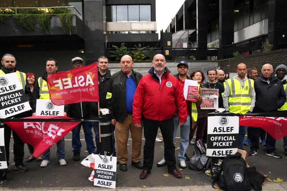 Aslef General Secretary Mick Whelan (centre) at a picket line at Euston station on Wednesday (PA)