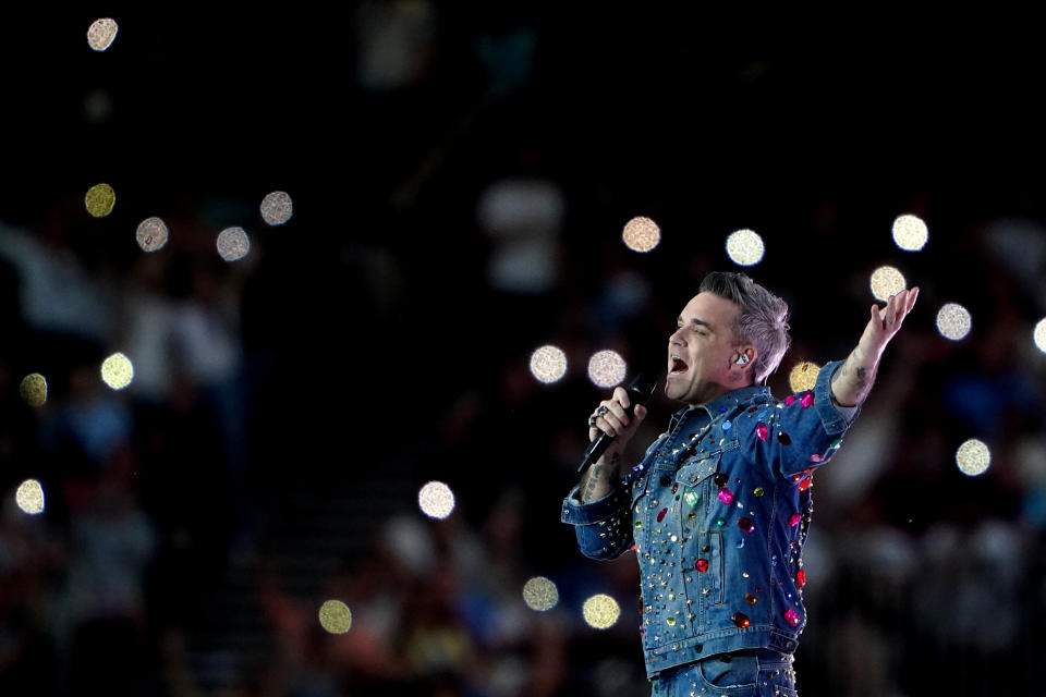Robbie Williams performs during the Soccer Aid for UNICEF match at The London Stadium, London. Picture date: Sunday June 12, 2022.