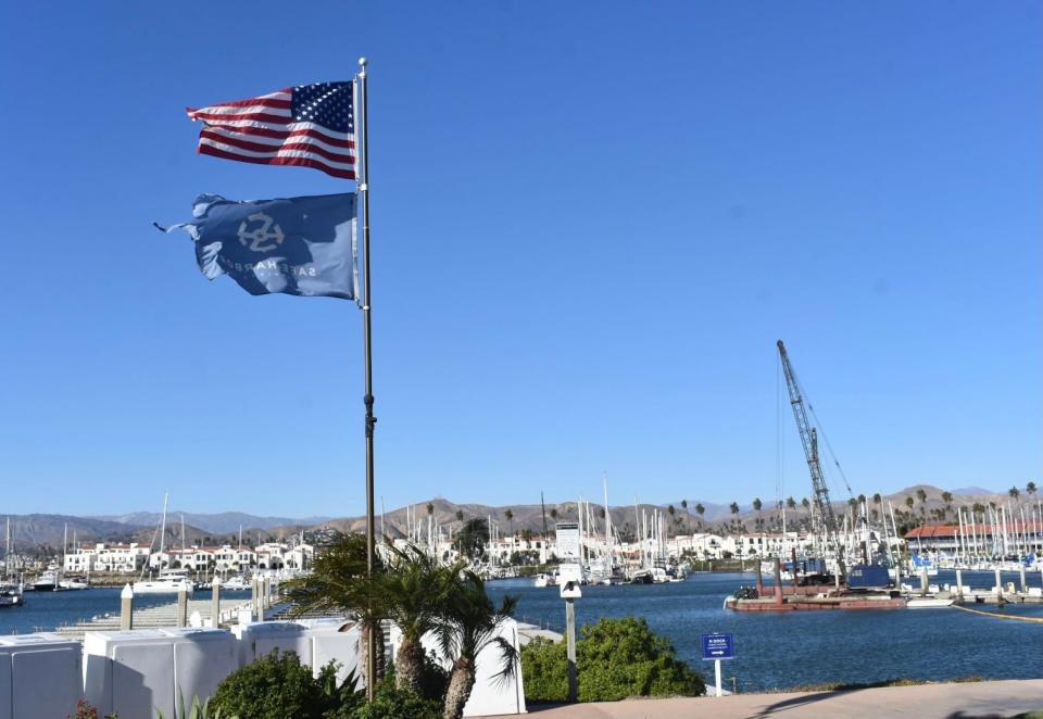 Strong winds lifted flags at Ventura Harbor Sunday afternoon as Santa Ana winds brought red flag conditions to Ventura County.