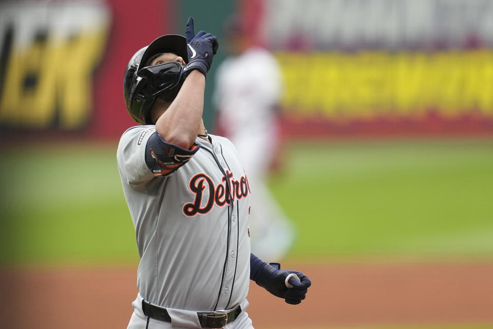 Detroit Tigers' Riley Greene gestures as he crosses home plate with a home run in the first inning of a baseball game against the Cleveland Guardians, Monday, May 6, 2024, in Cleveland. (AP Photo/Sue Ogrocki)