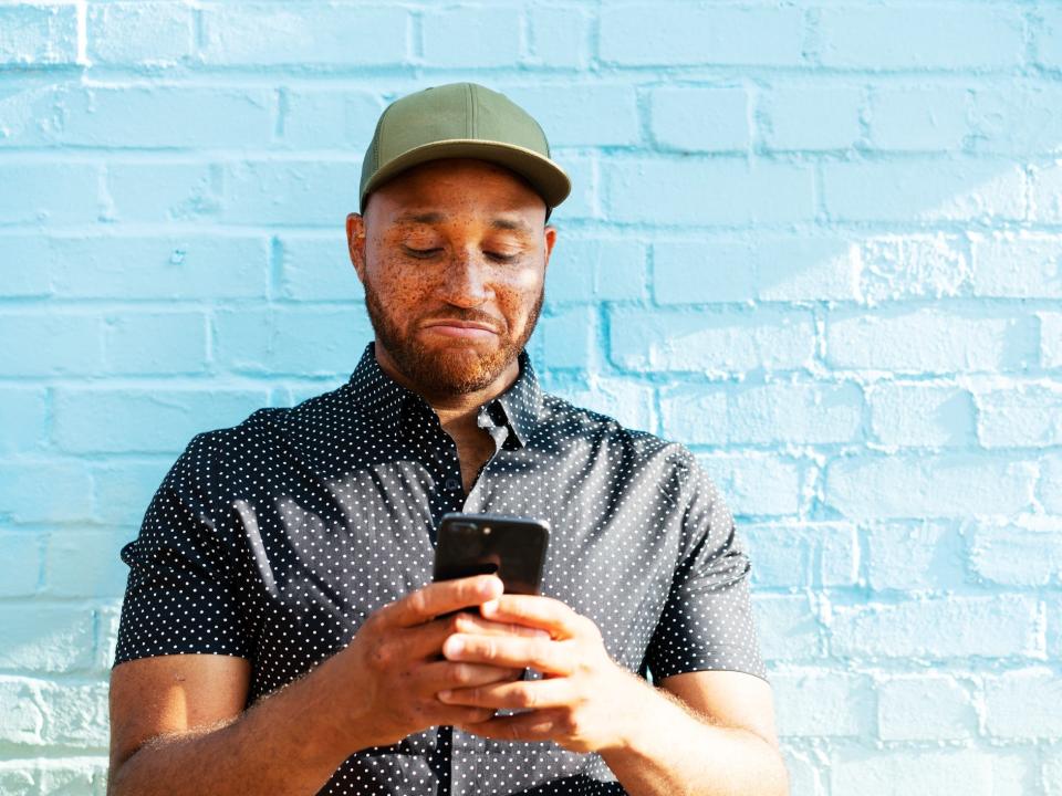 man using smart phone