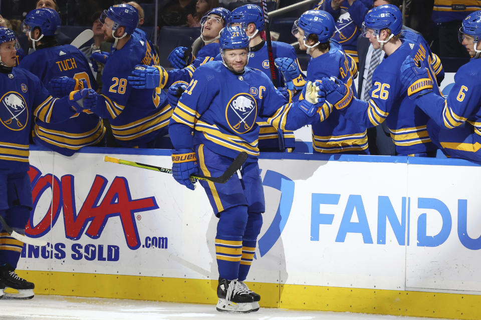 Buffalo Sabres right wing Kyle Okposo (21) celebrates his goal during the second period of an NHL hockey game against the St. Louis Blues, Saturday, Feb. 10, 2024, in Buffalo, N.Y. (AP Photo/Jeffrey T. Barnes)