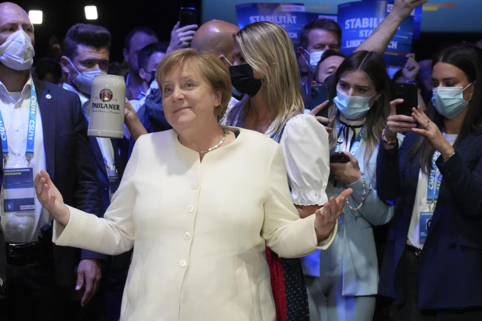 German chancellor Angela Merkel arrives for a state election campaign in Munich, Germany, Friday, Sept. 24, 2021 two days before the General election on Sunday, Sept. 26, 2021. (AP Photo/Matthias Schrader)