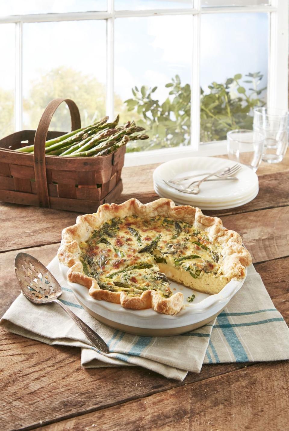 <p>Make the most of brunch and also asparagus season with this custardy treat! </p><p><strong><a href="https://www.countryliving.com/food-drinks/a39904707/asparagus-quiche-recipe/" rel="nofollow noopener" target="_blank" data-ylk="slk:Get the recipe for Asparagus Quiche;elm:context_link;itc:0;sec:content-canvas" class="link ">Get the recipe for Asparagus Quiche</a>.</strong></p>