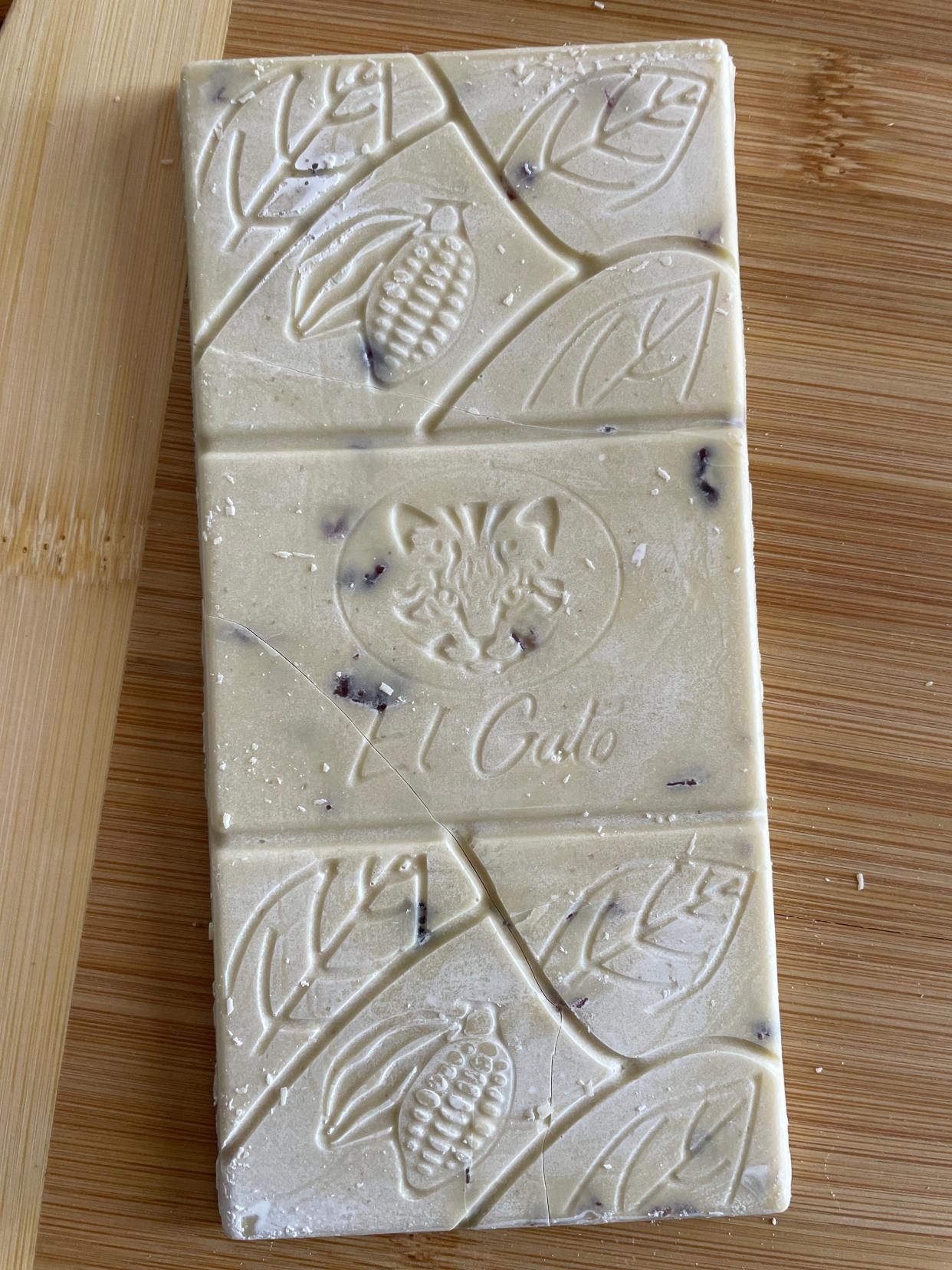 El Gato Chocolate's white chocolate with blueberries is made with cacao butter, powdered milk, panela and dried blueberries. Like all of the company's bars, it's imprinted with the image of an endangered wildcat.
