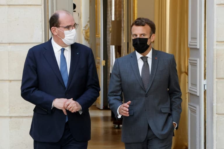 Le président Emmanuel Macron (D) et le Premier ministre Jean Castex lors d'un conseil des ministres à l'Elysee  à Paris le 9 juin 2021 - Ludovic MARIN © 2019 AFP