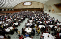 A general view shows Pope Francis arriving to have a lunch with the poor following a special mass to mark the new World Day of the Poor in Paul VI's hall at the Vatican, November 19, 2017. REUTERS/Max Rossi