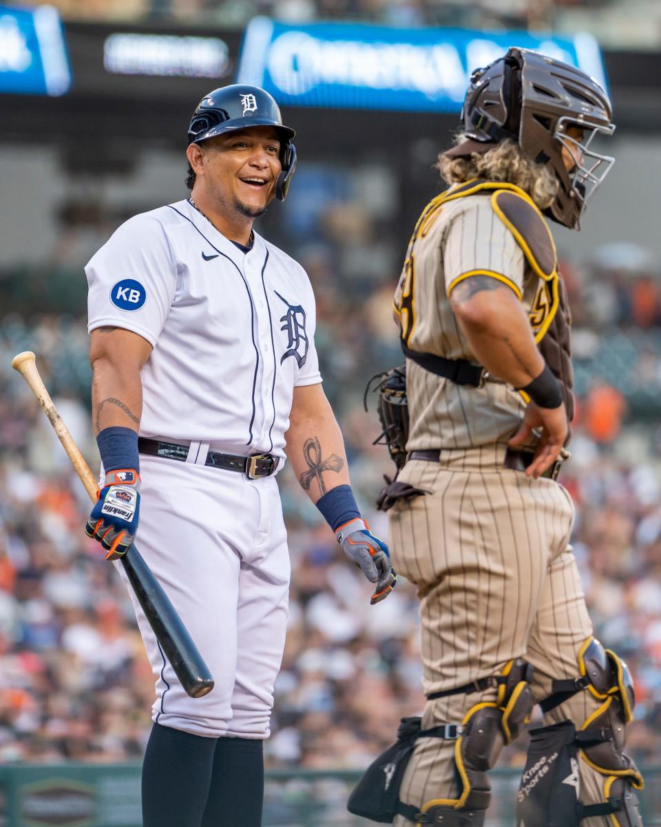 Tigers designated hitter Miguel Cabrera shares a laugh with Padres catcher Jorge Alfaro during the fourth inning on Tuesday, July 26, 2022, at Comerica Park.
