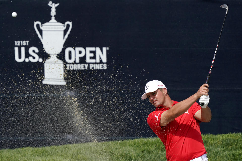 Bryson DeChambeau hits from the 18th green bunker during a practice round of the U.S. Open Golf Championship, Tuesday, June 15, 2021, at Torrey Pines Golf Course in San Diego. (AP Photo/Marcio Jose Sanchez)