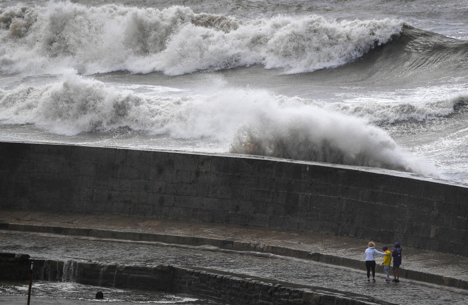 LYME RIGIS, ENGLAND - AUGUST 25: Waves crash over the Cobb on August 25, 2020 in Lyme Regis, United Kingdom. The Met Office have issued a yellow weather warning for wind and rain with gusts of 65mph possible inland and 70mph or more possible around coastal areas as Storm Francis passes over the UK. The storm is the second named storm in August and follows Storm Ellen last week. (Photo by Finnbarr Webster/Getty Images)