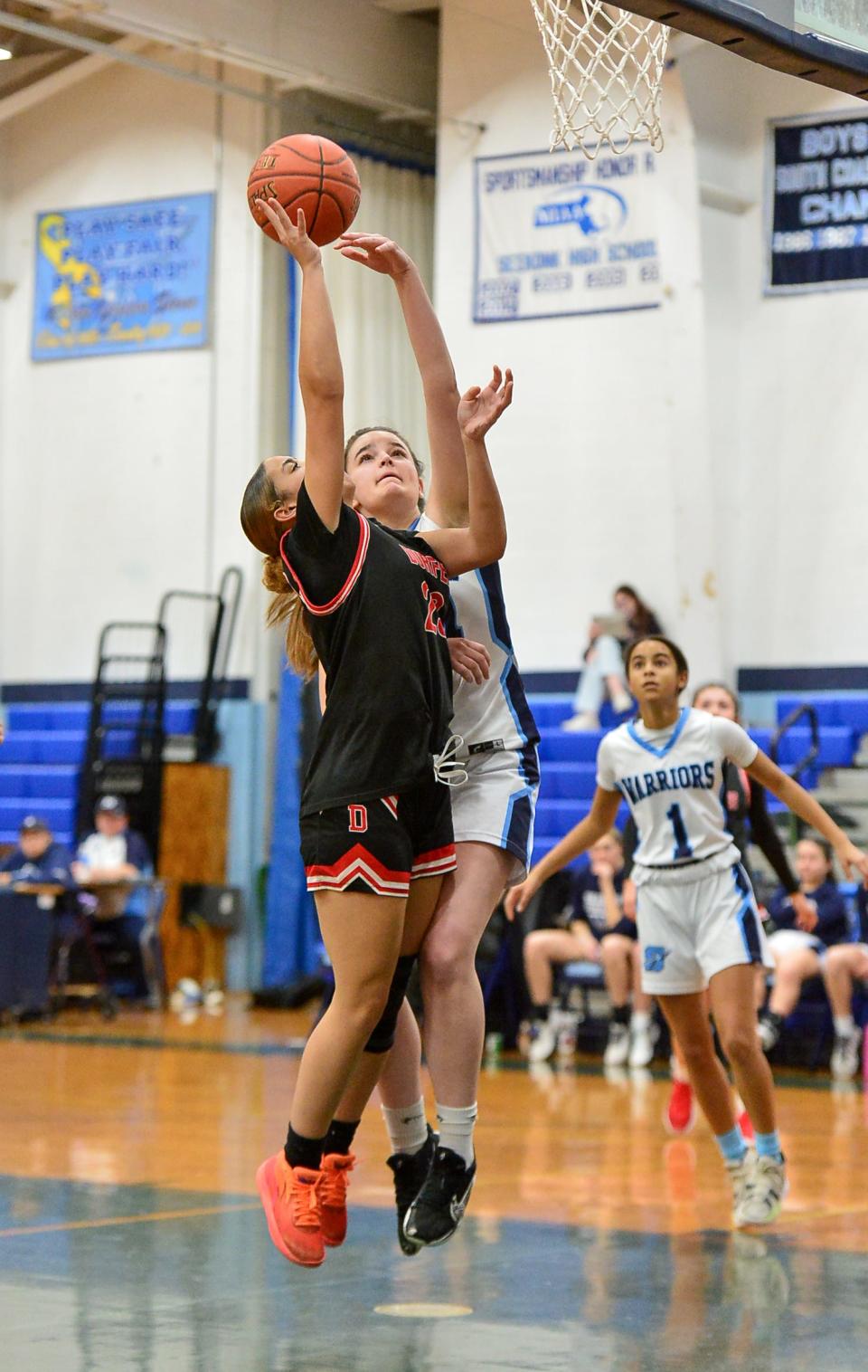 Durfee’s Jada Holley attempts a shot over Seekonk’s Emily Leonard during Wednesday’s game.